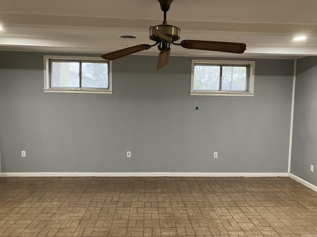 unfurnished room featuring ceiling fan