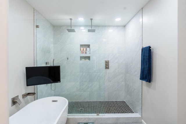 bathroom with independent shower and bath