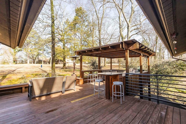 wooden deck with an outdoor bar