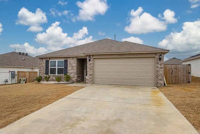 view of front facade featuring a garage and a front lawn