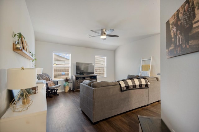 living room featuring dark hardwood / wood-style floors and ceiling fan