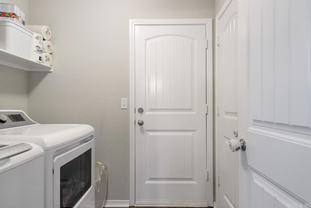 laundry area with washer and clothes dryer