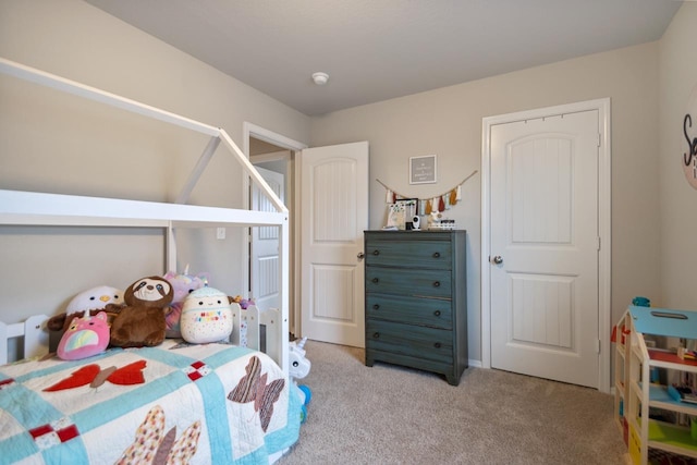 bedroom with light carpet