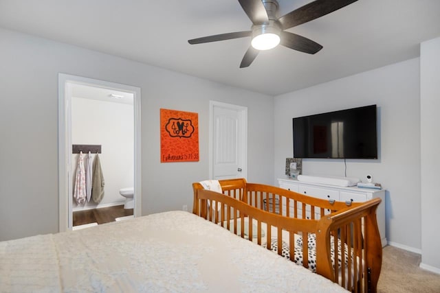 bedroom featuring light carpet and ceiling fan