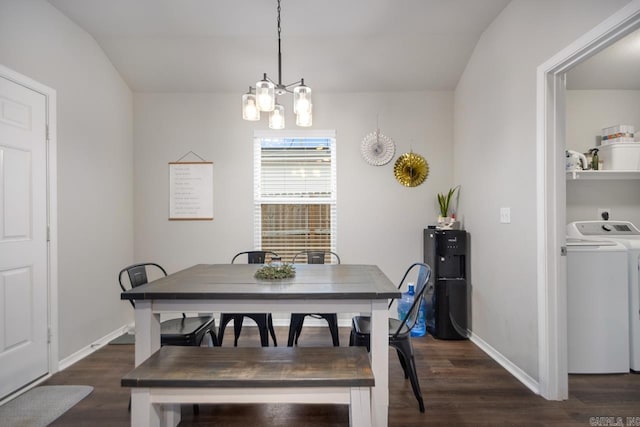 dining room featuring an inviting chandelier, washer / clothes dryer, water heater, and dark hardwood / wood-style floors