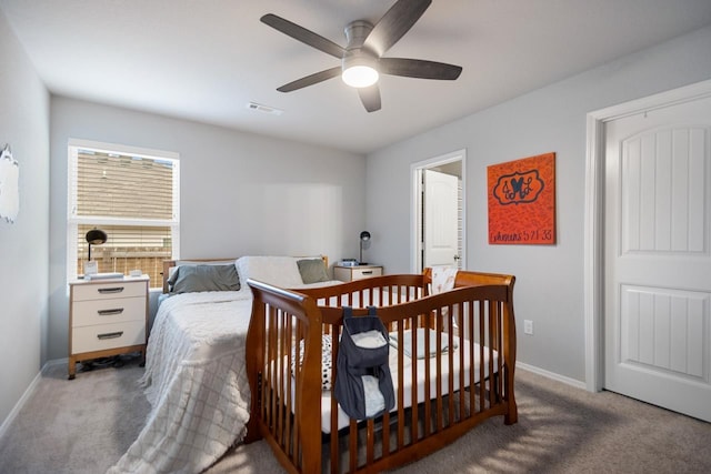 carpeted bedroom featuring ceiling fan