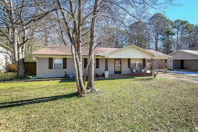 ranch-style house featuring a front yard and a porch