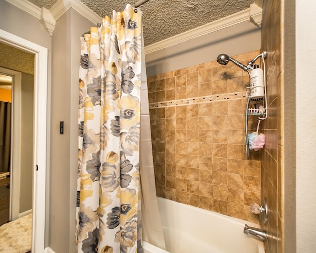 bathroom with ornamental molding, a textured ceiling, and shower / bath combo with shower curtain