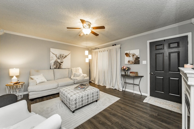 living room with dark hardwood / wood-style flooring, ceiling fan, crown molding, and a textured ceiling