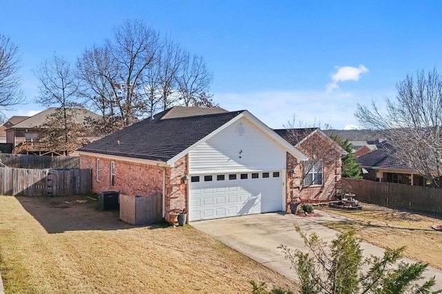 view of side of property with a garage