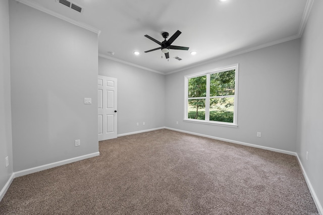 carpeted spare room with crown molding and ceiling fan