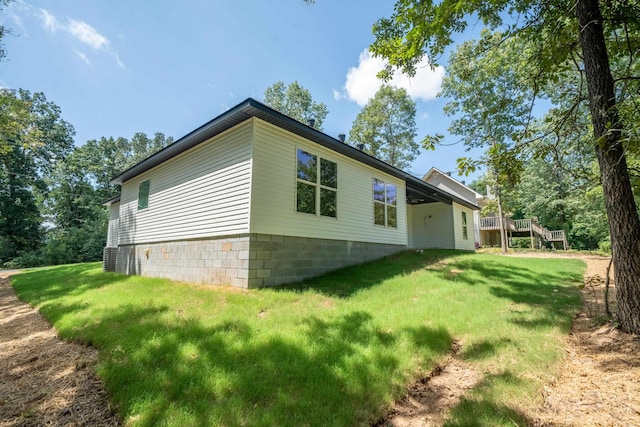 view of property exterior featuring a yard