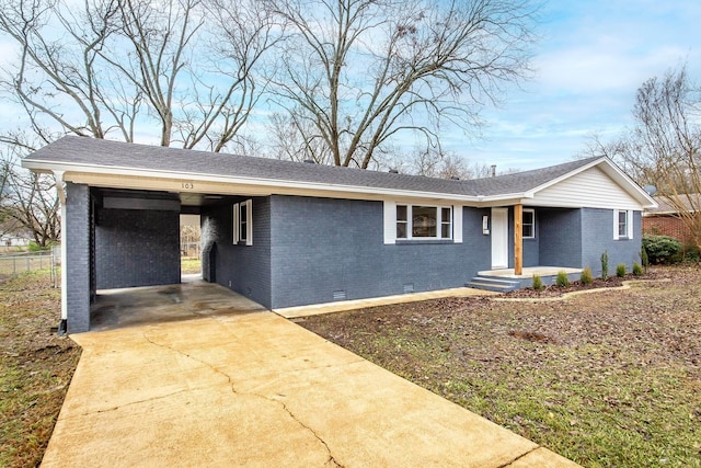 ranch-style home with a carport