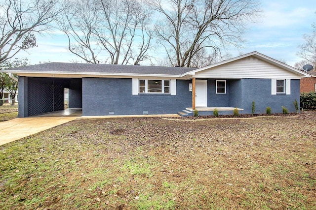 single story home featuring a carport