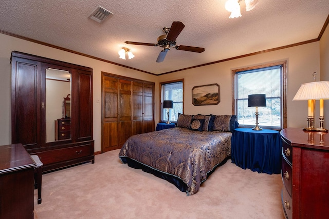 bedroom featuring ornamental molding, carpet flooring, and multiple windows