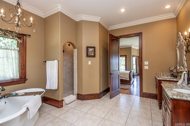 bathroom featuring crown molding, tile patterned flooring, an inviting chandelier, vanity, and separate shower and tub