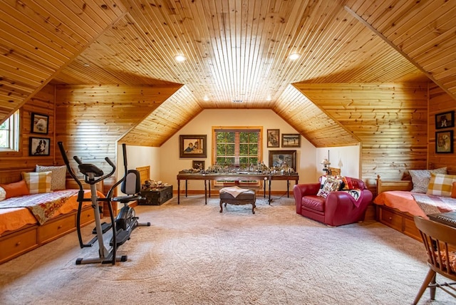 interior space with multiple windows, wood ceiling, wooden walls, and vaulted ceiling