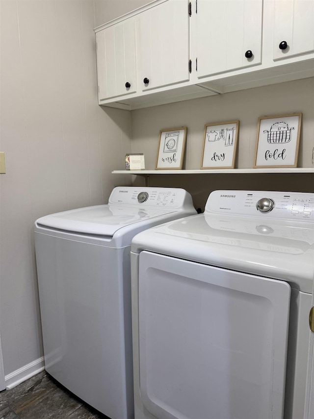 laundry area featuring cabinets and washer and dryer