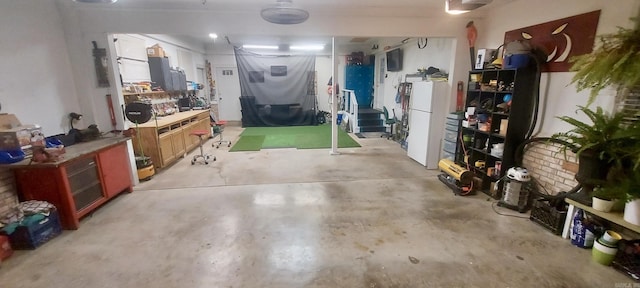 interior space featuring white refrigerator