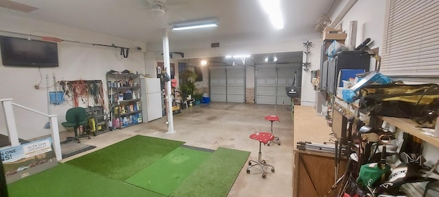 garage with white refrigerator