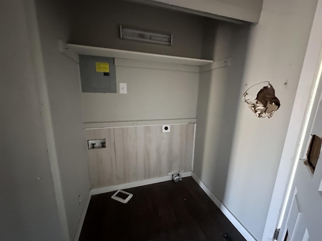 washroom featuring hookup for a washing machine, dark hardwood / wood-style floors, electric panel, and hookup for an electric dryer