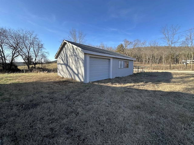 garage with a lawn