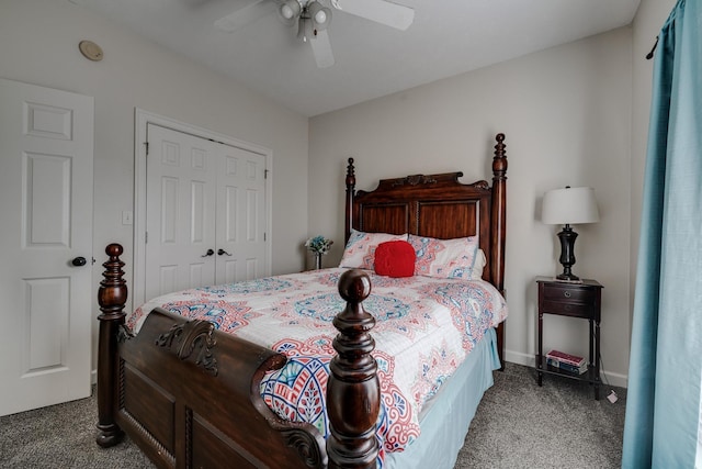 bedroom featuring ceiling fan, dark carpet, and a closet