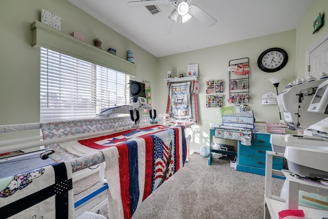 carpeted bedroom with ceiling fan