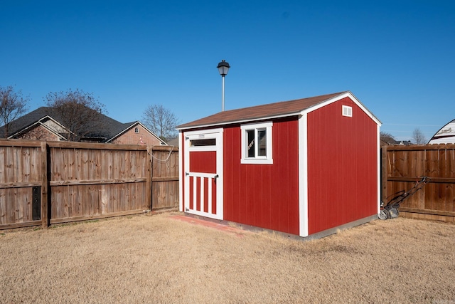 view of outdoor structure featuring a yard