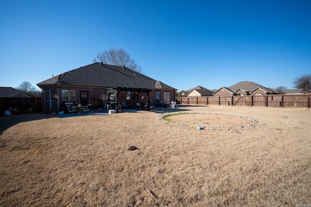 view of yard with a pergola and a patio