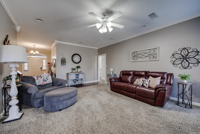 living room featuring crown molding, carpet flooring, and ceiling fan with notable chandelier