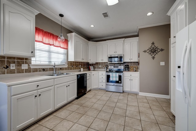 kitchen with pendant lighting, sink, crown molding, white cabinetry, and stainless steel appliances