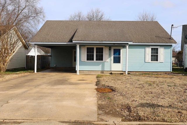 view of front of property with a carport