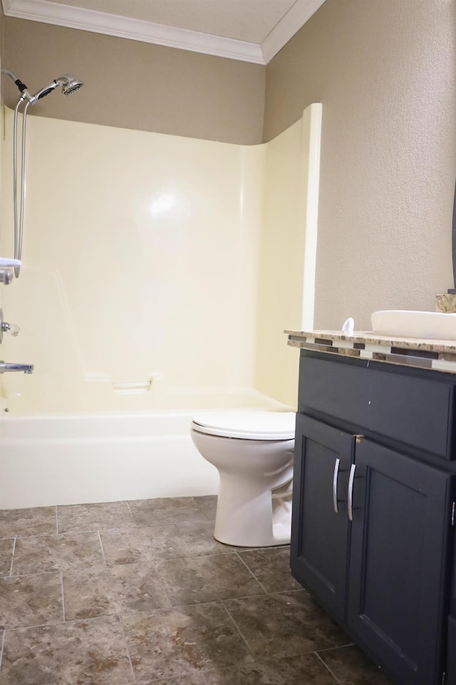 full bathroom with vanity, shower / bathing tub combination, crown molding, and toilet