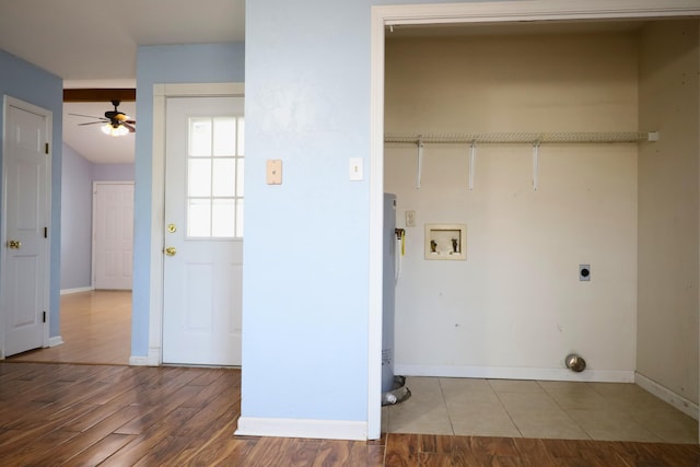 clothes washing area featuring electric dryer hookup, washer hookup, wood-type flooring, and ceiling fan