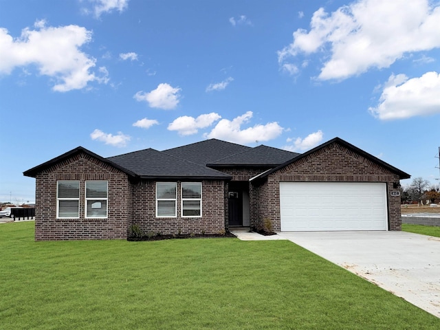 ranch-style home with brick siding, a shingled roof, a front lawn, concrete driveway, and a garage