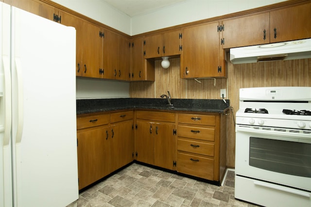 kitchen with sink and white appliances