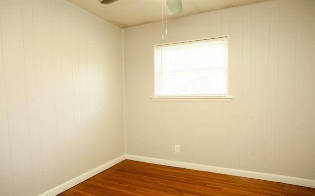 unfurnished room featuring hardwood / wood-style floors and ceiling fan