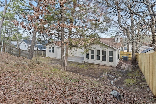 back of house featuring a patio area