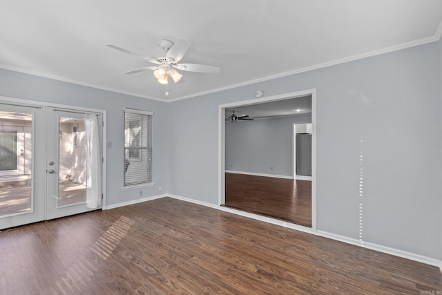 unfurnished room with crown molding, ceiling fan, dark hardwood / wood-style flooring, and french doors