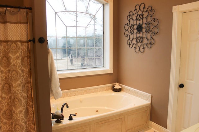 bathroom with shower with separate bathtub