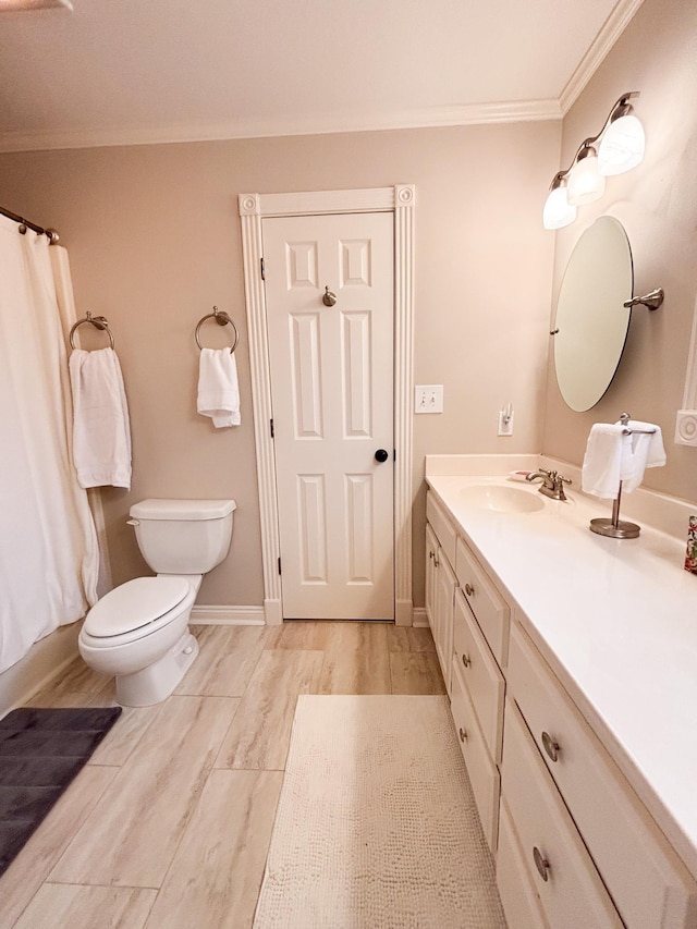 full bathroom featuring vanity, shower / tub combo, crown molding, and toilet