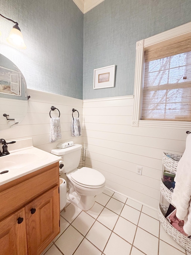 bathroom with vanity, tile patterned flooring, and toilet