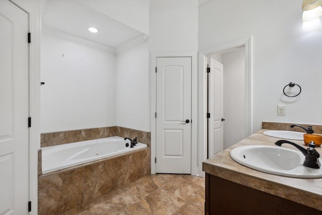 bathroom featuring vanity, a relaxing tiled tub, and crown molding