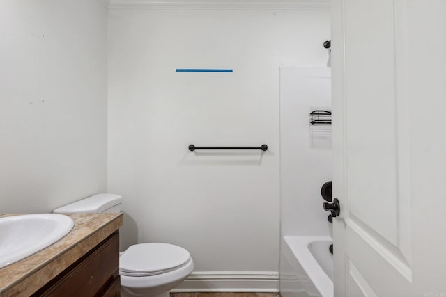 bathroom featuring vanity, toilet, and a bathing tub