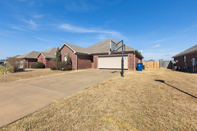 view of front facade with a garage and a front lawn