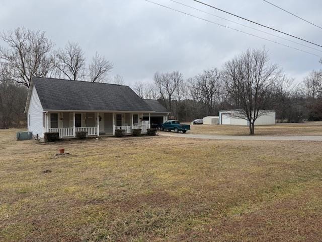 exterior space featuring a front yard and covered porch