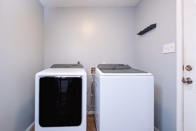 laundry room featuring washer and dryer