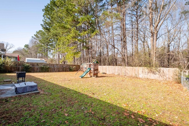 view of yard with a playground