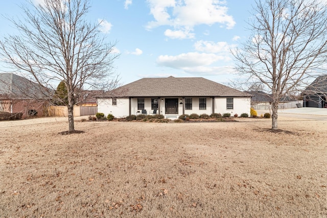 single story home featuring fence and covered porch